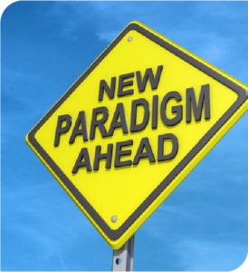 Photo of a street sign with the words "New Paradigm Ahead"