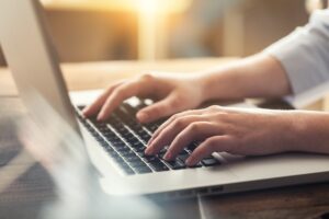 Person working on a laptop