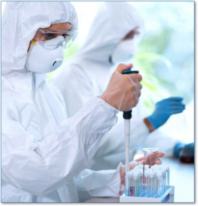 Photo of a leb technician wearing personal protective equipment holding a pipette and placing samples into test tubes.