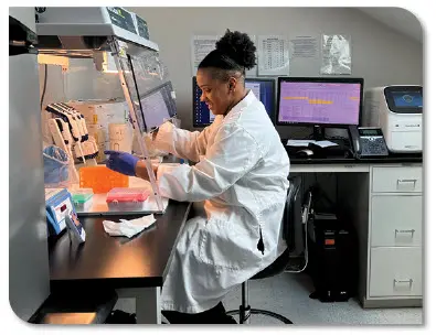 Woman working at a laboratory workstation