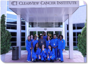 Photo of Clearview Cancer staff outside the main entrance