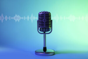 Retro microphone on color background